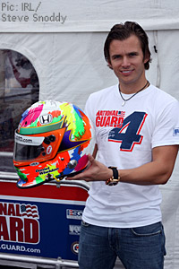 Dan Wheldon with the prize-winning helmet design