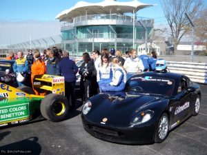 A younger crowd gathers around Moore's Ginetta