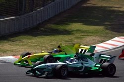 Pakistan's Adam Khan tussles with the Australian car