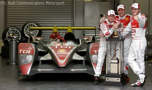 Allan McNish, Rinaldo Capello and Tom Kristensen celebrate victory