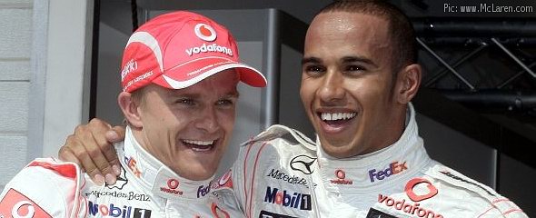 Hamilton and Kovalainen celebrate a 1-2 in Hungary qualifying