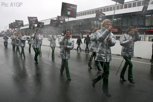 Even the grid girls suffered in the weather. Poor loves.