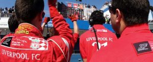 The Liverpool crew cheer their driver's victory