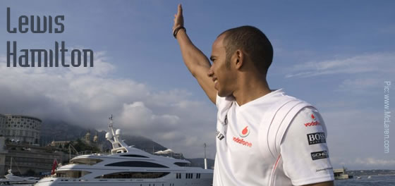 Lewis Hamilton waves to fans in Monaco Harbour