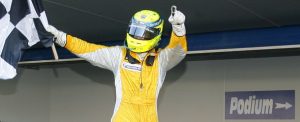 James Walker celebrates on his way to the podium