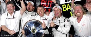 The Brawn GP team and Richard Branson celebrate their 1-2