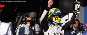 Jenson Button celebrates his first pole since Melbourne 2006