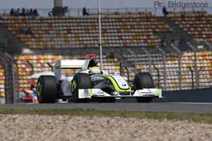 Jenson Button performs for the fan on Saturday in China