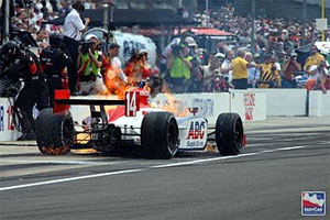 Meira on fire in Foyt pitbox 