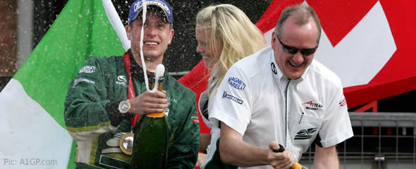 Adam Carroll and Mark Gallagher celebrate winning two races and a championship in one day