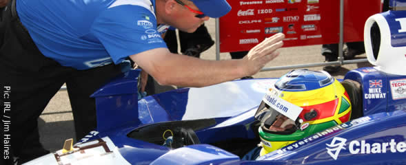 Mike Conway gets some pit row instruction at Indy