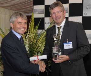 Lord Drayson hands Ross Brawn his MIA Outstanding Achievement Award