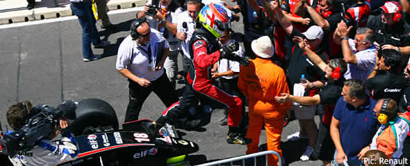 Jon Lancaster leaps from his car in victory