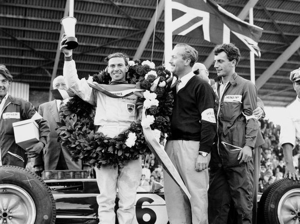 Jim Clark and Colin Chapman after winning the 1963 British Grand Prix