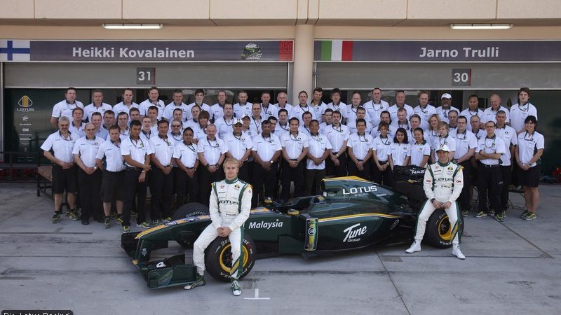 The Lotus Racing F1 drivers and crew