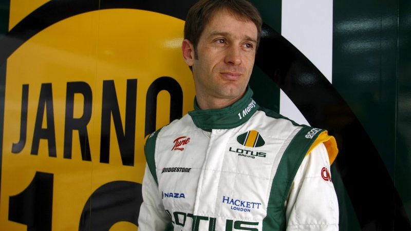 Jarno Trulli shows off the new-look Lotus F1 race gear