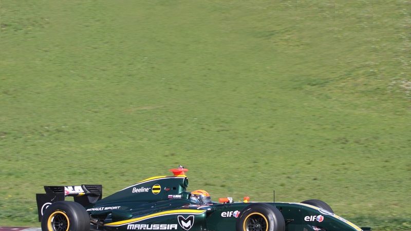 It's got the green and yellow - but no mention of Lotus anywhere