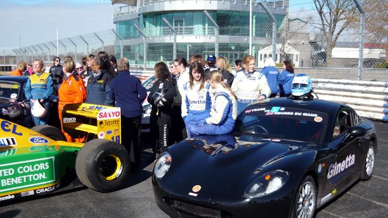 A younger crowd gathers around Moore's Ginetta