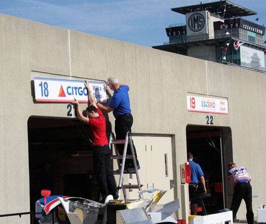 Setting up the garages for Dale Coyne Racing's Milka Duno and Alex Lloyd