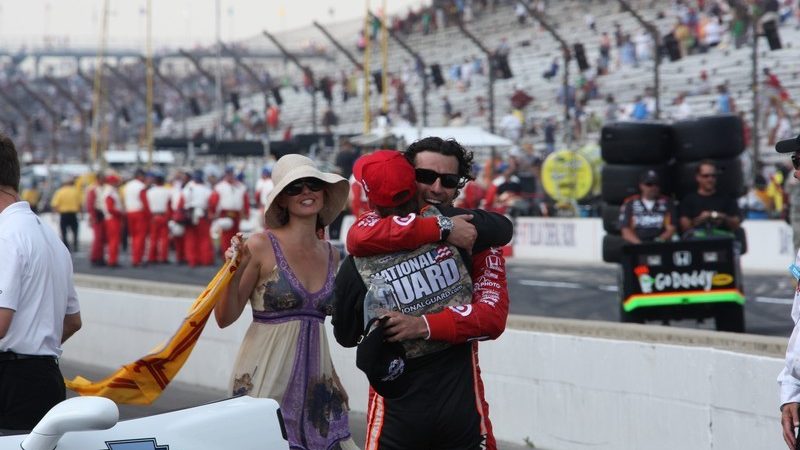 Wheldon congratulates Franchitti as Ashley Judd runs up