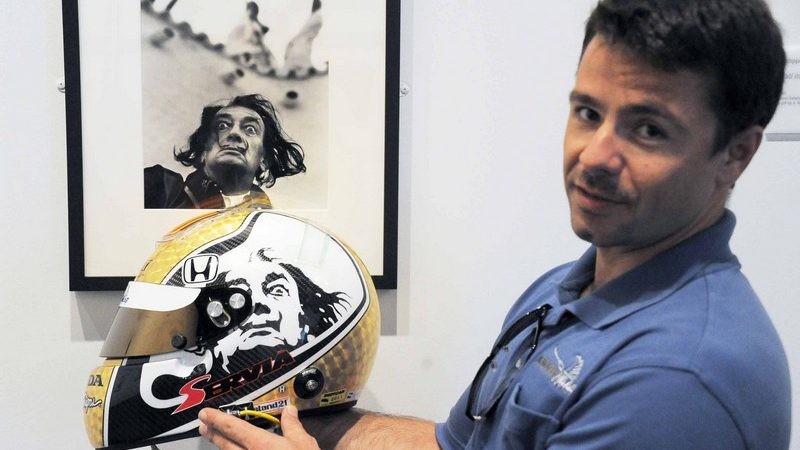 Oriol Servia shows off the inspiration for his race helmet