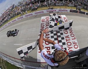Mike Conway takes the chequered flag