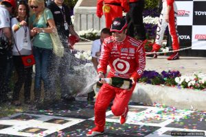 New championship leader Dario Franchitti lets fly