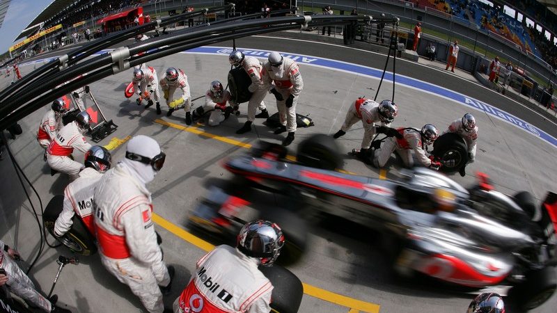 Lewis Hamilton makes one of the day's many pitstops